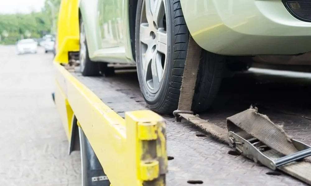 car-transporter-breakdown-lorry-working-using-locked-belt-transport-other-green-car